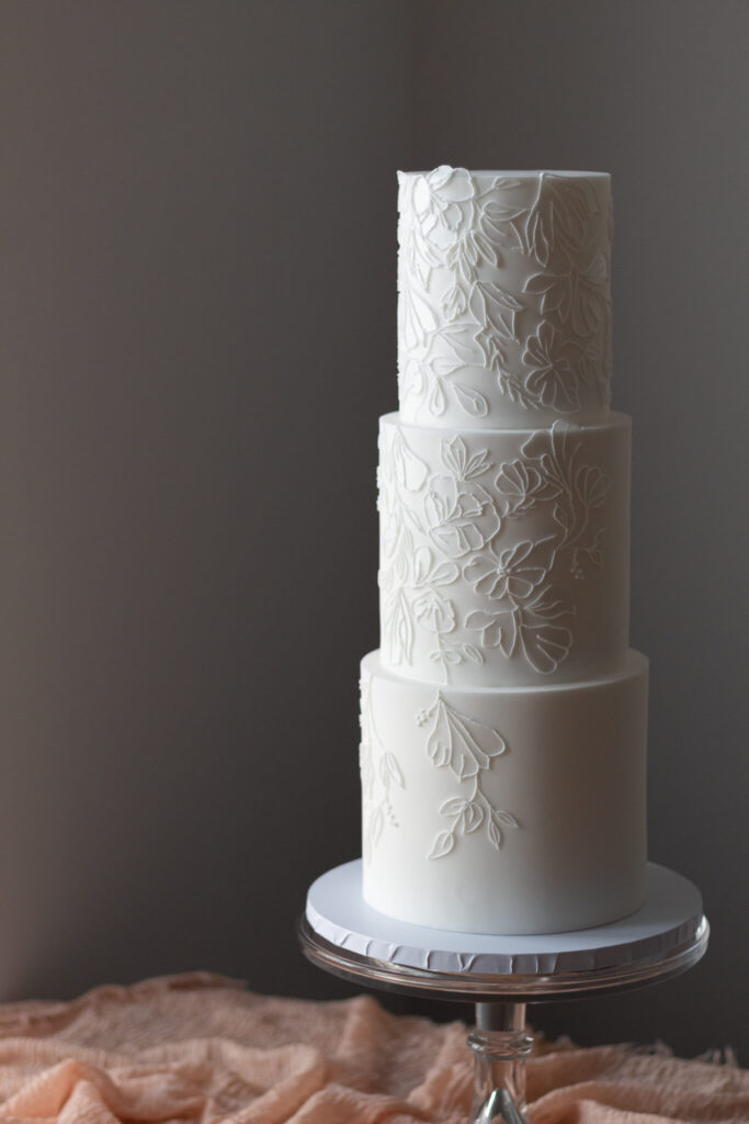 3 tier white bridal lace inspired wedding cake